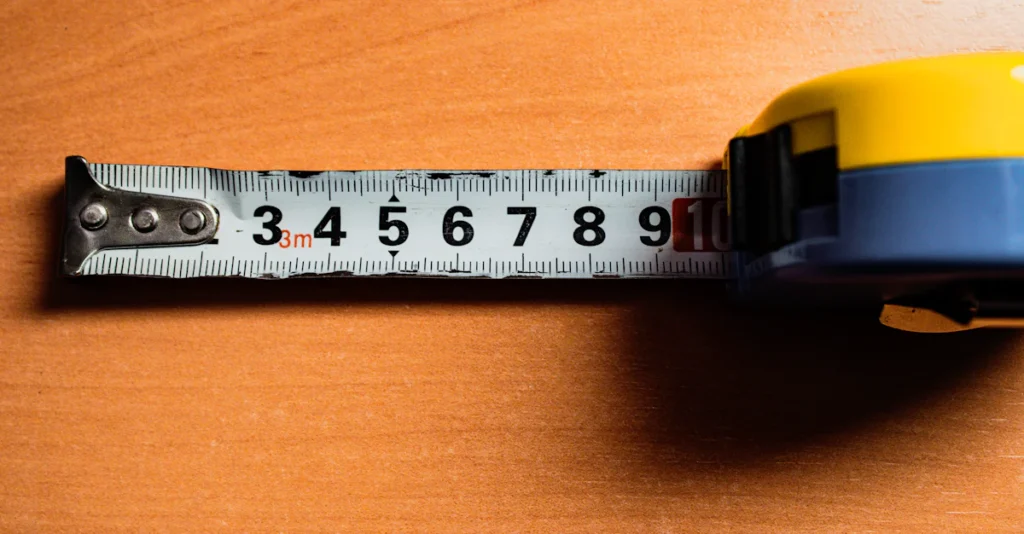 Measuring tape against a wooden surface for flooring estimates